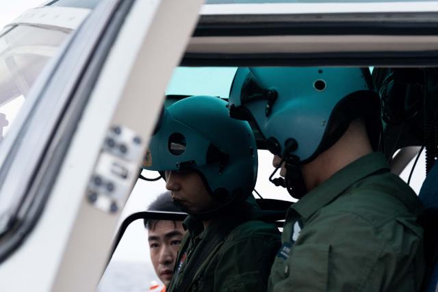 (260713) -- QINGDAO, July 13, 2026 (Xinhua) -- Chinese military personnel prepare for helicopter take-off during the maritime phase of the "Joint Sea-2026" exercise between China and Russia, July 10, 2026. The "Joint Sea-2026" exercise between China and Russia concluded at a military port in Qingdao in east China's Shandong Province Monday, with all planned exercise missions finished.
   Launched on July 6, the "Joint Sea-2026" is the twelfth in the series dating back to 2012. (Xinhua/Li Jie)