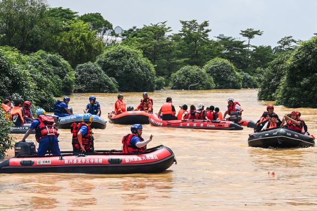 (260713) -- NANNING, July 13, 2026 (Xinhua) -- Rescuers from various provincial regions of China are pictured in an evacuation operation in Guigang City, south China's Guangxi Zhuang Autonomous Region, July 9, 2026. Triggered by Typhoon Maysak, heavy downpours battered multiple areas in south China's Guangxi Zhuang Autonomous Region.
   Rescue operation is underway in Guangxi, with rescuers from different parts of the country actively involved in the disaster rescue and relief efforts. (Xinhua/Cao Yiming)