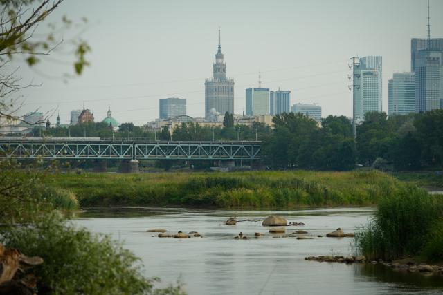 (260713) -- WARSAW, July 13, 2026 (Xinhua) -- Low water levels expose shallow areas of the Vistula River in Warsaw, Poland, July 13, 2026. Poland's longest river, the Vistula, has fallen to historically low water levels amid drought. Recent data from the Institute of Meteorology and Water Management showed that the river level at the Warsaw-Bulwary monitoring station had dropped to 19 centimeters, far below the normal level of around 230 centimeters. (Photo by Jaap Arriens/Xinhua)