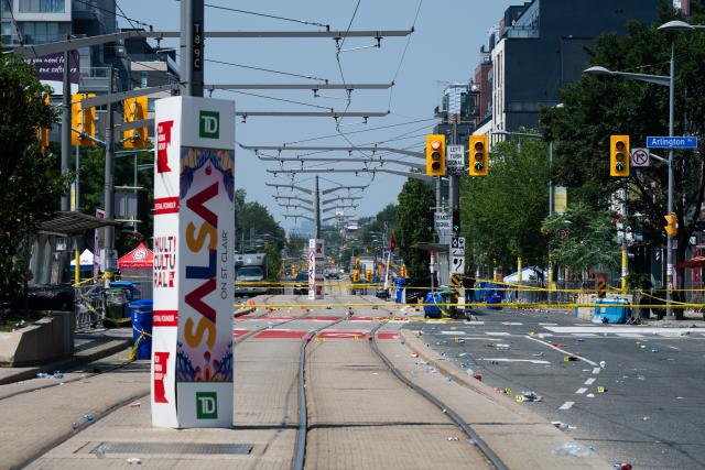 (260714) -- BEIJING, July 14, 2026 (Xinhua) -- This photo taken on July 12, 2026 shows the scene after a shooting in Toronto, Canada.
  Two people were killed and six others injured in a shooting at a street festival in Toronto, Canada's largest city, on Saturday night, local police confirmed. (Photo by Li Haitao/Xinhua)