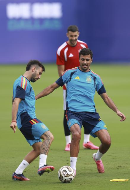 (260714) -- DALLAS, July 14, 2026 (Xinhua) -- Rodri (front R) and Mikel Merino (front L) of Spain attend a training session ahead of the semi-final match between France and Spain at the 2026 FIFA World Cup in Dallas, the United States, on July 13, 2026. (Xinhua/Hu Xingyu)