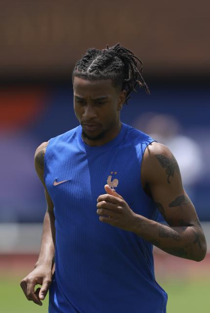 (260714) -- DALLAS, July 14, 2026 (Xinhua) -- Michael Olise of France attends a training session ahead of the semi-final match between France and Spain at the 2026 FIFA World Cup in Dallas, the United States, on July 13, 2026. (Xinhua/Hu Xingyu)
