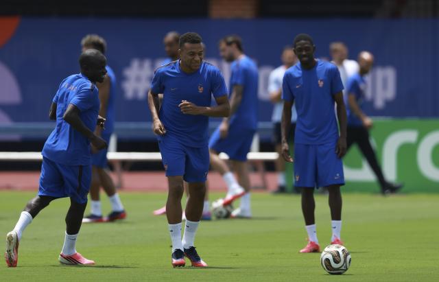 (260714) -- DALLAS, July 14, 2026 (Xinhua) -- N'Golo Kante (1st L), Kylian Mbappe (C) and Ousmane Dembele of France attend a training session ahead of the semi-final match between France and Spain at the 2026 FIFA World Cup in Dallas, the United States, on July 13, 2026. (Xinhua/Hu Xingyu)