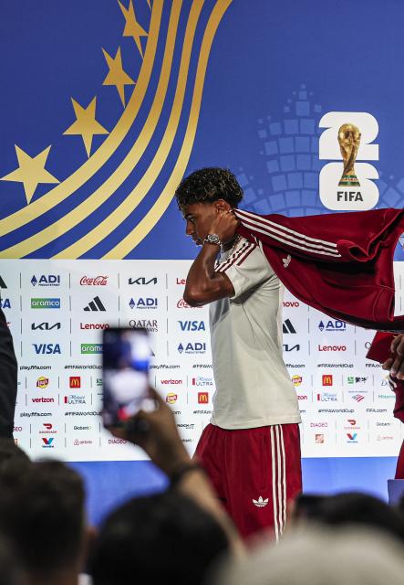 (260714) -- DALLAS, July 14, 2026 (Xinhua) -- Lamine Yamal of Spain leaves after a press conference ahead of the semi-final match between France and Spain at the 2026 FIFA World Cup in Dallas, the United States, on July 13, 2026. (Xinhua/Hu Xingyu)