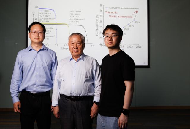 (260714) -- BEIJING, July 14, 2026 (Xinhua) -- Academician Li Yongfang (C), researcher Meng Lei (L) and PhD student Wu Ruihan pose for a group photo at the Institute of Chemistry, Chinese Academy of Sciences (ICCAS), in Beijing, capital of China, July 3, 2026. A new type of solar cell developed by a team of Chinese scientists has achieved a certified steady-state power conversion efficiency of 28.04 percent, setting a new world record for this class of solar cells. 
  The team, led by Li Yongfang, an academician at the Institute of Chemistry, Chinese Academy of Sciences, and Meng Lei, a researcher from the institute, developed the high-performance perovskite-organic tandem solar cell by incorporating a photo-transformable stabilizer. The study was published online in Nature on Monday. (Xinhua/Jin Liwang)