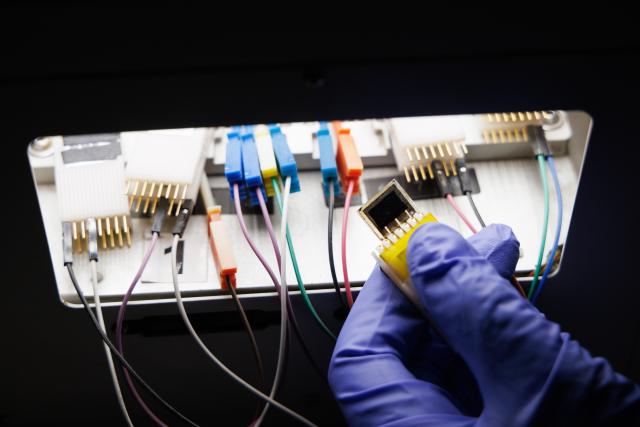(260714) -- BEIJING, July 14, 2026 (Xinhua) -- A researcher tests a device of the high-performance perovskite-organic tandem solar cell at a laboratory of the Institute of Chemistry, Chinese Academy of Sciences (ICCAS), in Beijing, capital of China, July 3, 2026. A new type of solar cell developed by a team of Chinese scientists has achieved a certified steady-state power conversion efficiency of 28.04 percent, setting a new world record for this class of solar cells. 
  The team, led by Li Yongfang, an academician at the Institute of Chemistry, Chinese Academy of Sciences, and Meng Lei, a researcher from the institute, developed the high-performance perovskite-organic tandem solar cell by incorporating a photo-transformable stabilizer. The study was published online in Nature on Monday. (Xinhua/Jin Liwang)