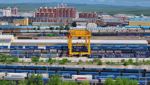 (260714) -- HARBIN, July 14, 2026 (Xinhua) -- An aerial drone photo taken on July 13, 2026 shows a China-Europe freight train undergoing cargo transshipment at Manzhouli Station in Manzhouli, north China's Inner Mongolia Autonomous Region. China Railway Harbin Group Co., Ltd. has advanced the development of digital port systems and railway express services while continuously improving connectivity among port infrastructure facilities. These efforts have enhanced the efficiency and capacity of the eastern corridor of the China-Europe freight train service. 
   As of June 2026, the cumulative number of China-Europe Railway Express trips via the eastern corridor had exceeded 40,000.
   The eastern corridor, consisting of three major railway ports of Manzhouli, Suifenhe and Tongjiang, has so far connected more than 60 Chinese cities with 14 European countries through 27 regular routes, serving as a vivid example of efforts to promote high-quality Belt and Road cooperation. (Photo by Huang Xu/Xinhua)
