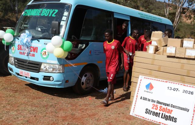 (260714) -- SHURUGWI, July 14, 2026 (Xinhua) -- Shurugwi Football Club players get out of a mini-bus donated to them by Chinese gold mining firm Chenxi Investments in Shurugwi, Midlands Province, Zimbabwe, July 13, 2026. TO GO WITH "Chinese mining firm commended for boosting local development in Zimbabwe" (Photo by Shaun Jusa/Xinhua)