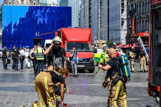(260714) -- BRUSSELS, July 14, 2026 (Xinhua) -- Firefighters work near the fire site of the Oxy building on De Brouckere Square, Brussels, Belgium, July 14, 2026. Multiple people have died on Tuesday in a fire at the well-known Oxy building on De Brouckere Square, in the center of Brussels.
   According to local media, 6 people are still missing. The fire brigade has deployed en masse for a major search and rescue operation. (Xinhua/Peng Ziyang)