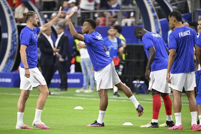 (260715) -- DALLAS, July 15, 2026 (Xinhua) -- Kylian Mbappe (2nd L) of France cheers with teammates before the semifinal match between France and Spain at the 2026 FIFA World Cup at Dallas Stadium in Dallas, the United States, July 14, 2026. (Xinhua/Chen Yichen)