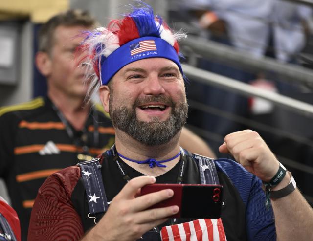 (260715) -- DALLAS, July 15, 2026 (Xinhua) -- A fan reacts before the semifinal match between France and Spain at the 2026 FIFA World Cup at Dallas Stadium in Dallas, the United States, July 14, 2026. (Xinhua/Chen Yichen)