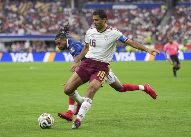 (260715) -- DALLAS, July 15, 2026 (Xinhua) -- Rodri (front) of Spain competes during the semifinal match between France and Spain at the 2026 FIFA World Cup at Dallas Stadium in Dallas, the United States, July 14, 2026. (Xinhua/Huang Zongzhi)