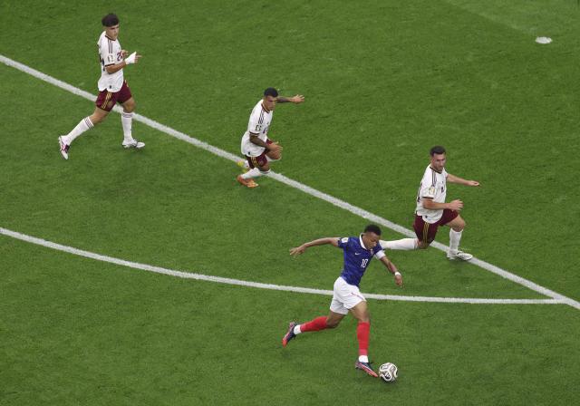 (260715) -- DALLAS, July 15, 2026 (Xinhua) -- Kylian Mbappe (front) of France competes during the semifinal match between France and Spain at the 2026 FIFA World Cup at Dallas Stadium in Dallas, the United States, July 14, 2026. (Xinhua/Hu Xingyu)