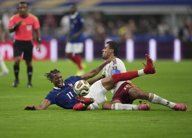 (260715) -- DALLAS, July 15, 2026 (Xinhua) -- Michael Olise (L) of France falls down during the semifinal match between France and Spain at the 2026 FIFA World Cup at Dallas Stadium in Dallas, the United States, July 14, 2026. (Xinhua/Wu Xiaoling)