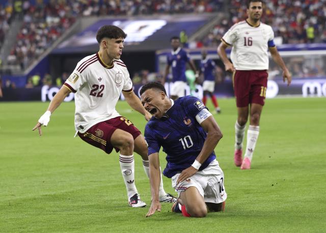 (260715) -- DALLAS, July 15, 2026 (Xinhua) -- Kylian Mbappe (C) of France falls down during the semifinal match between France and Spain at the 2026 FIFA World Cup at Dallas Stadium in Dallas, the United States, July 14, 2026. (Xinhua/Xu Zijian)