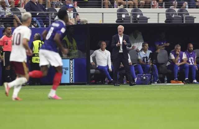 (260715) -- DALLAS, July 15, 2026 (Xinhua) -- Didier Deschamps (R front), head coach of France, looks on during the semifinal match between France and Spain at the 2026 FIFA World Cup at Dallas Stadium in Dallas, the United States, July 14, 2026. (Xinhua/Xu Zijian)