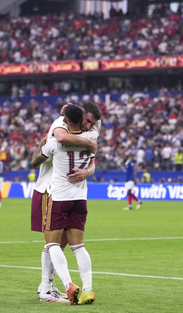 (260715) -- DALLAS, July 15, 2026 (Xinhua) -- Pedro Porro (R) of Spain celebrates a goal with teammate during the semifinal match between France and Spain at the 2026 FIFA World Cup at Dallas Stadium in Dallas, the United States, July 14, 2026. (Xinhua/Huang Zongzhi)