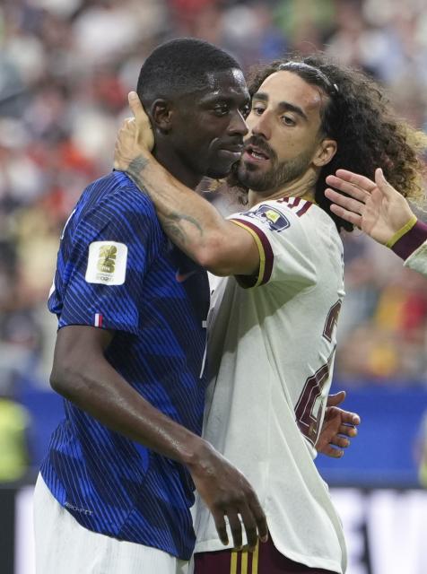 (260715) -- DALLAS, July 15, 2026 (Xinhua) -- Ousmane Dembele (L) of France and Mikel Oyarzabal of Spain are seen during the semifinal match between France and Spain at the 2026 FIFA World Cup at Dallas Stadium in Dallas, the United States, July 14, 2026. (Xinhua/Huang Zongzhi)