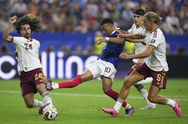 (260715) -- DALLAS, July 15, 2026 (Xinhua) -- Kylian Mbappe (2nd L) of France shoots during the semifinal match between France and Spain at the 2026 FIFA World Cup at Dallas Stadium in Dallas, the United States, July 14, 2026. (Xinhua/Wu Xiaoling)