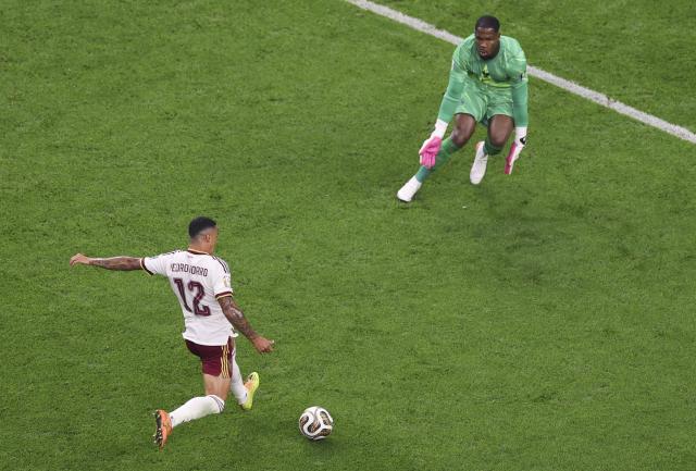 (260715) -- DALLAS, July 15, 2026 (Xinhua) -- Pedro Porro (L) of Spain shoots and scores during the semifinal match between France and Spain at the 2026 FIFA World Cup at Dallas Stadium in Dallas, the United States, July 14, 2026. (Xinhua/Hu Xingyu)