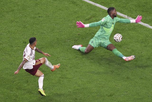(260715) -- DALLAS, July 15, 2026 (Xinhua) -- Pedro Porro (L) of Spain shoots and scores during the semifinal match between France and Spain at the 2026 FIFA World Cup at Dallas Stadium in Dallas, the United States, July 14, 2026. (Xinhua/Hu Xingyu)