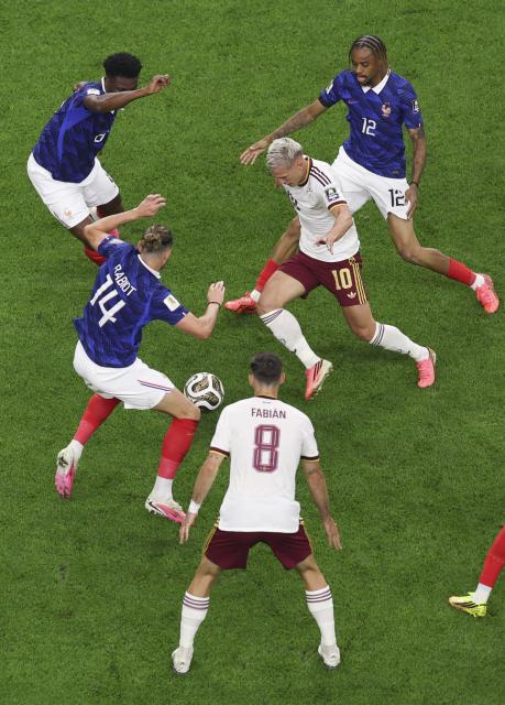 (260715) -- DALLAS, July 15, 2026 (Xinhua) -- Dani Olmo (2nd R) of Spain breaks through during the semifinal match between France and Spain at the 2026 FIFA World Cup at Dallas Stadium in Dallas, the United States, July 14, 2026. (Xinhua/Hu Xingyu)