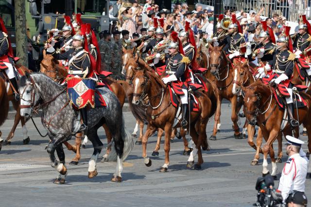 (260714) -- PARIS, July 14, 2026 (Xinhua) -- Participants attend the annual Bastille Day military parade in Paris, France, on July 14, 2026. (Photo by Henri Szwarc/Xinhua)