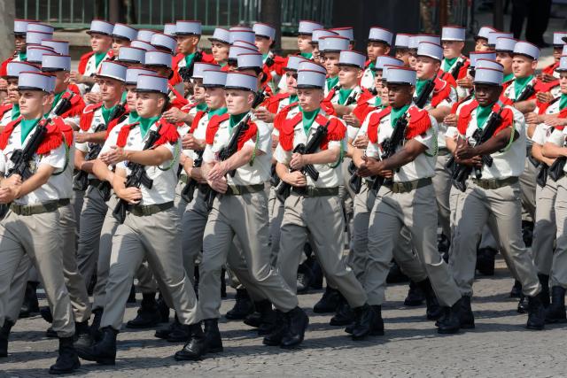 (260714) -- PARIS, July 14, 2026 (Xinhua) -- Participants attend the annual Bastille Day military parade in Paris, France, on July 14, 2026. (Photo by Henri Szwarc/Xinhua)