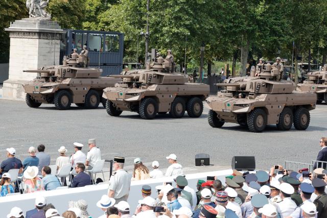 (260714) -- PARIS, July 14, 2026 (Xinhua) -- Participants attend the annual Bastille Day military parade in Paris, France, on July 14, 2026. (Photo by Henri Szwarc/Xinhua)