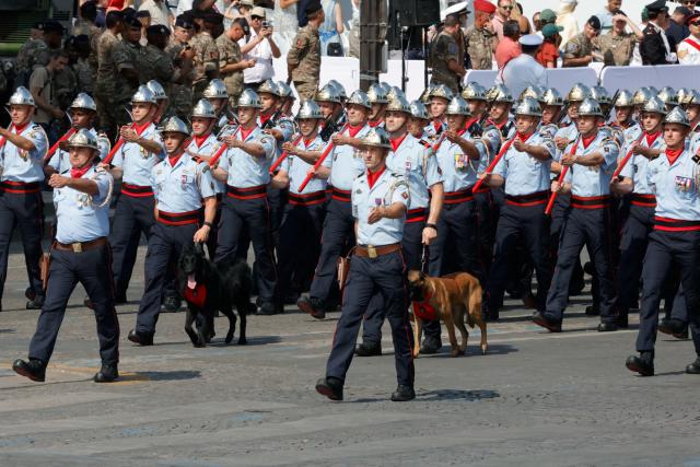 (260714) -- PARIS, July 14, 2026 (Xinhua) -- Participants attend the annual Bastille Day military parade in Paris, France, on July 14, 2026. (Photo by Henri Szwarc/Xinhua)