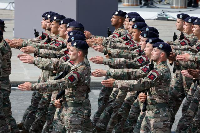 (260714) -- PARIS, July 14, 2026 (Xinhua) -- Participants attend the annual Bastille Day military parade in Paris, France, on July 14, 2026. (Photo by Henri Szwarc/Xinhua)