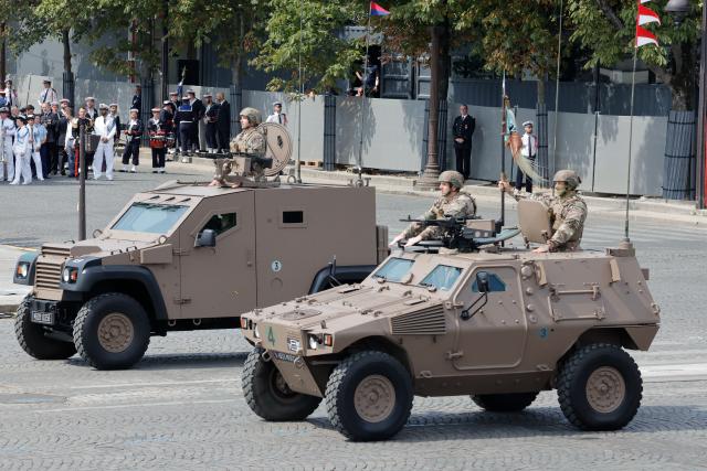 (260714) -- PARIS, July 14, 2026 (Xinhua) -- Participants attend the annual Bastille Day military parade in Paris, France, on July 14, 2026. (Photo by Henri Szwarc/Xinhua)