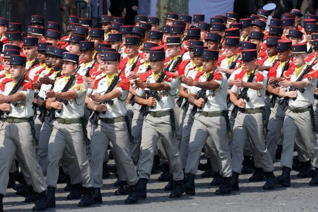 (260714) -- PARIS, July 14, 2026 (Xinhua) -- Participants attend the annual Bastille Day military parade in Paris, France, on July 14, 2026. (Photo by Henri Szwarc/Xinhua)