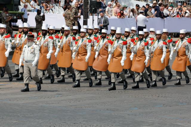 (260714) -- PARIS, July 14, 2026 (Xinhua) -- Participants attend the annual Bastille Day military parade in Paris, France, on July 14, 2026. (Photo by Henri Szwarc/Xinhua)