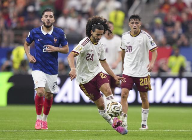 (260715) -- DALLAS, July 15, 2026 (Xinhua) -- Marc Cucurella (C) of Spain competes during the semifinal match between France and Spain at the 2026 FIFA World Cup at Dallas Stadium in Dallas, the United States, July 14, 2026. (Xinhua/Huang Zongzhi)