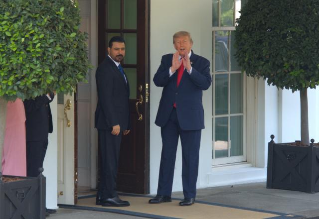 (260714) -- WASHINGTON, July 14, 2026 (Xinhua) -- U.S. President Donald Trump (R) welcomes Iraqi Prime Minister Ali al-Zaidi at the White House in Washington, D.C., the United States, July 14, 2026. Trump said Tuesday that the United States will take investment deals with Gulf states instead of fees for ships passing through the Strait of Hormuz. (Photo by Li Yuanqing/Xinhua)