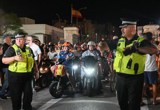 (260715) -- GIBRALTAR, July 15, 2026 (Xinhua) -- Gibraltar's police officers maintain order for motorcyclists from Spain at the land border port between Gibraltar and Spain on July 15, 2026. The European Union (EU) and Britain on Tuesday formally signed an agreement in respect of Gibraltar in Brussels, removing routine checks at the land border between Gibraltar and Spain. 
   Under the agreement, the movement of goods and workers between Gibraltar and Spain will be significantly facilitated, boosting economic links between Gibraltar and the EU. (Xinhua/Cheng Min)