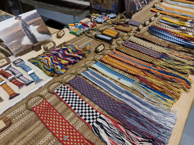 (260715) -- CHENGDU, July 15, 2026 (Xinhua) -- This photo taken on April 11, 2026 shows textiles featuring Tibetan cultural elements at a shop of Jiaru, a Chengdu-based lifestyle brand, in Chengdu, southwest China's Sichuan Province. TO GO WITH "China Focus: From plateau to Paris: New generation giving Tibetan crafts new life" (Xinhua/Tang Wenhao)