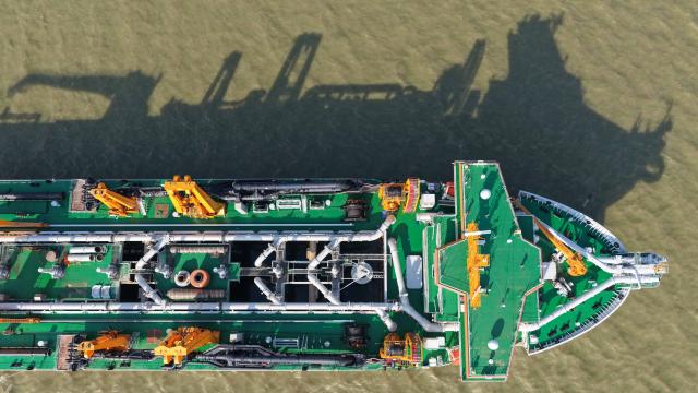 (260715) -- GUANGZHOU, July 15, 2026 (Xinhua) -- An aerial drone photo taken on May 27, 2026 shows the "Junguang" dredger at the Pearl River Estuary area, in south China's Guangdong Province. The "Junguang," a mega dredger with a 35,000 cubic meter capacity, was recently put into operation. Measuring 198 meters in length, with a maximum dredging depth of 120 meters and a deadweight of 60,483 tonnes, the vessel is the largest of its kind in Asia. 
  The vessel is equipped with the self-developed intelligent dredging control systems. It is capable of exceptional performance, including strong soil penetration, deep dredging, long-distance transport, and extended blowing capabilities. It is expected to be widely used in port and waterway dredging, deep-sea sand extraction, land reclamation, deep-sea mining, trench excavation and backfilling, gravel bed construction, and deep-sea pipeline laying. (Xinhua/Deng Hua)