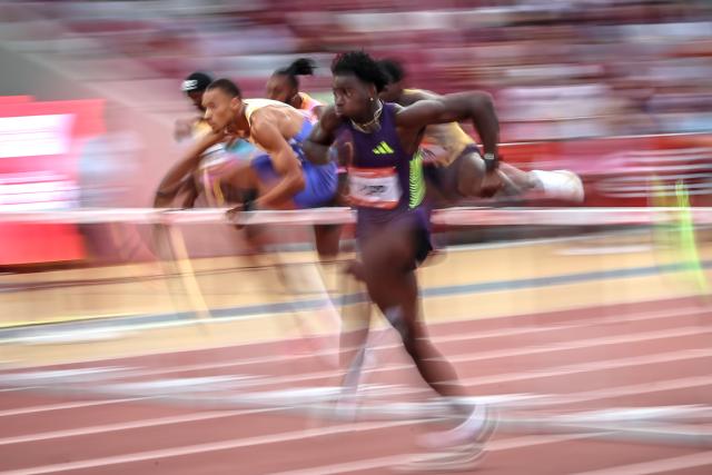 (260715) -- BUDAPEST, July 15, 2026 (Xinhua) -- Ja'Kobe Tharp (front) of the United States competes during the men's 110-meter hurdles event at the Gyulai Istvan Memorial - Hungarian Athletics Grand Prix in Budapest, Hungary, on July 14, 2026. (Photo by David Balogh/Xinhua)