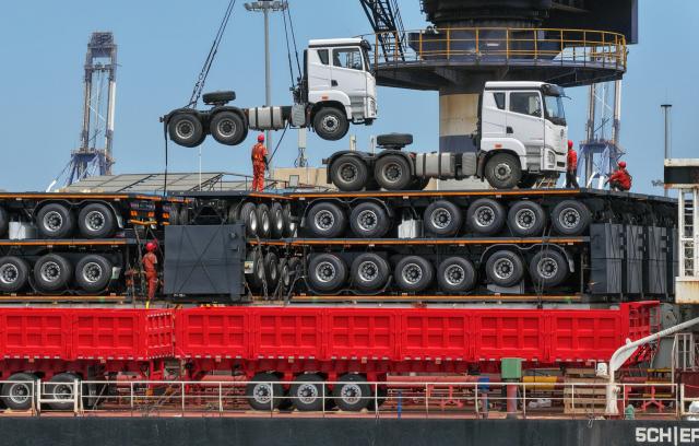 (260715) -- BEIJING, July 15, 2026 (Xinhua) -- A drone photo taken on July 15, 2026 shows vehicles being loaded onto a ship at Yantai Port in east China's Shandong Province. China's gross domestic product (GDP) grew 4.7 percent year on year in the first half of 2026, data from the National Bureau of Statistics (NBS) showed Wednesday. (Photo by Tang Ke/Xinhua)