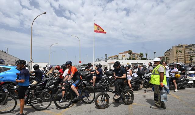 (260715) -- GIBRALTAR, July 15, 2026 (Xinhua) -- People ride across the land border crossing between Gibraltar and Spain, on July 15, 2026. Routine border checks at the Spain-Gibraltar land crossing were lifted in the early hours of Wednesday, in line with new border arrangements under the post-Brexit agreement between the European Union and Britain.
   The agreement, signed in Brussels on Tuesday, began provisional application on Wednesday and remains subject to the consent of the European Parliament and the completion of ratification procedures by both sides. (Xinhua/Cheng Min)