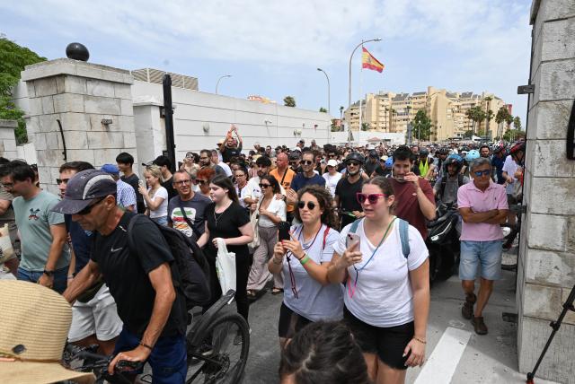 (260715) -- GIBRALTAR, July 15, 2026 (Xinhua) -- People walk across the land border crossing between Gibraltar and Spain, on July 15, 2026. Routine border checks at the Spain-Gibraltar land crossing were lifted in the early hours of Wednesday, in line with new border arrangements under the post-Brexit agreement between the European Union and Britain.
   The agreement, signed in Brussels on Tuesday, began provisional application on Wednesday and remains subject to the consent of the European Parliament and the completion of ratification procedures by both sides. (Xinhua/Cheng Min)