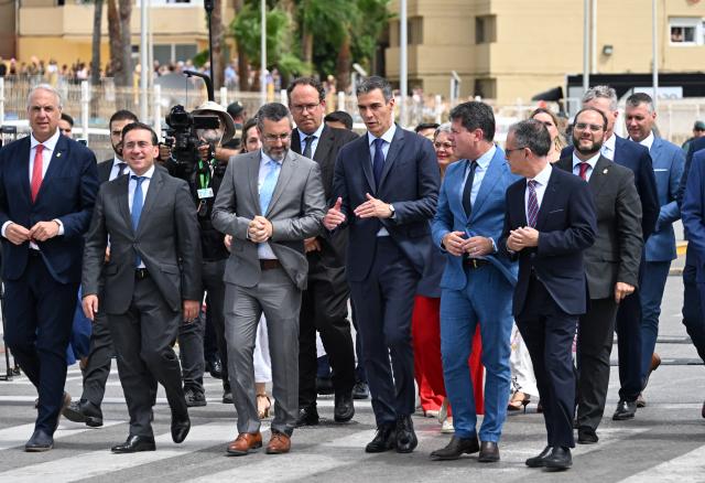 (260715) -- GIBRALTAR, July 15, 2026 (Xinhua) -- Spanish Prime Minister Pedro Sanchez (3rd R, front) comes to the site of the lifting of routine border checks at the land border crossing between Gibraltar and Spain, on July 15, 2026. Routine border checks at the Spain-Gibraltar land crossing were lifted in the early hours of Wednesday, in line with new border arrangements under the post-Brexit agreement between the European Union and Britain.
   The agreement, signed in Brussels on Tuesday, began provisional application on Wednesday and remains subject to the consent of the European Parliament and the completion of ratification procedures by both sides. (Xinhua/Cheng Min)