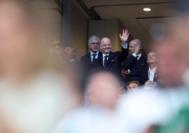 (260716) -- ATLANTA, July 16, 2026 (Xinhua) -- FIFA President Gianni Infantino (C) gestures from the stands before the semifinal match between Argentina and England at the 2026 FIFA World Cup at Atlanta Stadium in Atlanta, the United States, July 15, 2026. (Xinhua/Cao Can)