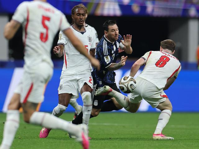 (260716) -- ATLANTA, July 16, 2026 (Xinhua) -- Lionel Messi (2nd R) of Argentina is fouled during the semifinal match between Argentina and England at the 2026 FIFA World Cup at Atlanta Stadium in Atlanta, the United States, July 15, 2026. (Xinhua/Cao Can)