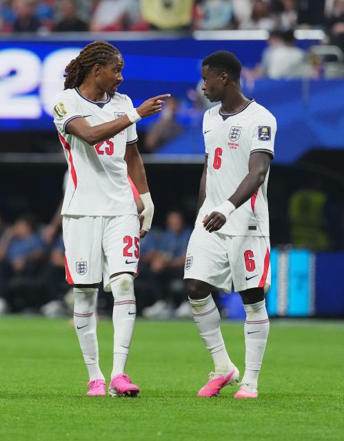 (260716) -- ATLANTA, July 16, 2026 (Xinhua) -- Marc Guehi (R) of England communicates with Djed Spence of England during the semifinal match between Argentina and England at the 2026 FIFA World Cup at Atlanta Stadium in Atlanta, the United States, July 15, 2026. (Xinhua/Xu Chang)