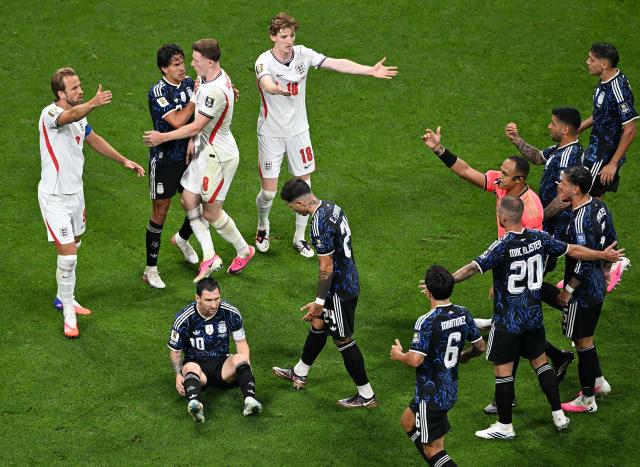 (260716) -- ATLANTA, July 16, 2026 (Xinhua) -- Lionel Messi (bottom L) of Argentina reacts after falling during the semifinal match between Argentina and England at the 2026 FIFA World Cup at Atlanta Stadium in Atlanta, the United States, July 15, 2026. (Xinhua/Xiao Yijiu)