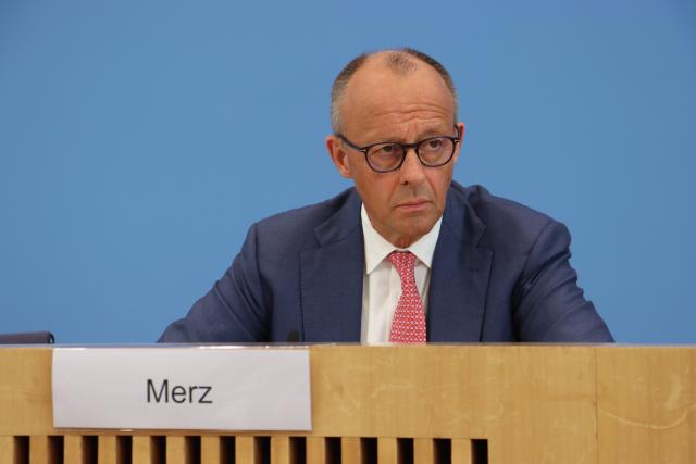 (260715) -- BERLIN, July 15, 2026 (Xinhua) -- German Chancellor Friedrich Merz speaks during his summer press conference in Berlin, Germany on July 15, 2026. German Chancellor Friedrich Merz said on Wednesday that he does not want the United States to interfere in German elections. (Xinhua/Li Hanlin)