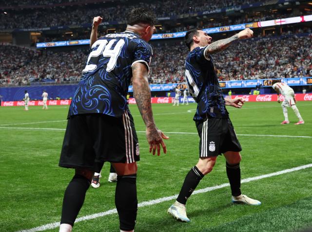 (260716) -- ATLANTA, July 16, 2026 (Xinhua) -- Lionel Messi (R) of Argentina celebrates as Enzo Fernandez of Argentina scores during the semifinal match between Argentina and England at the 2026 FIFA World Cup at Atlanta Stadium in Atlanta, the United States, July 15, 2026. (Xinhua/Li Ming)